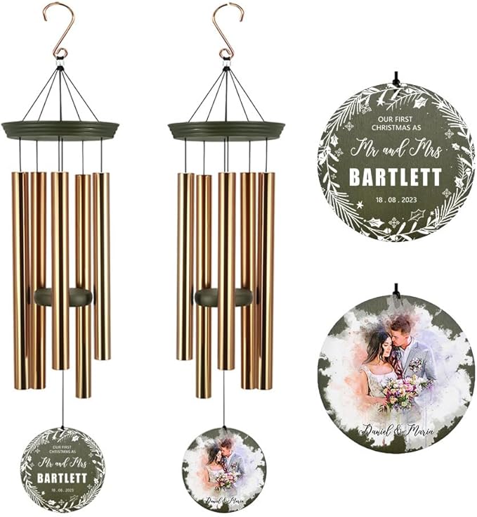 Set view of gold-tone wind chimes with two hanging round engraved ornaments and tubes