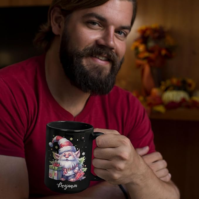 Black ceramic mug with holiday gnome graphic and name Benjamin, man holding mug