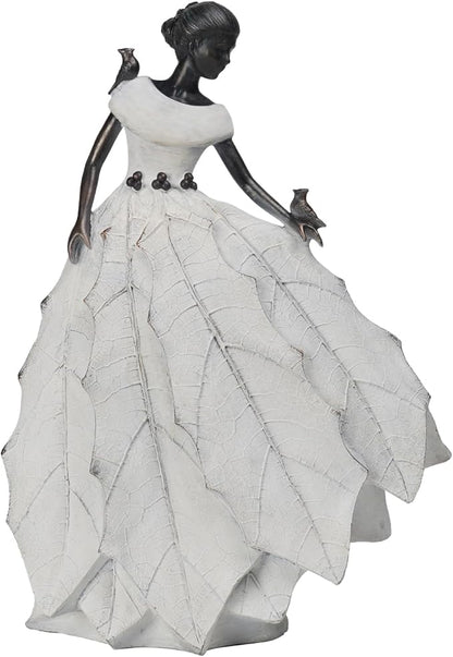White resin fairy maiden statue with layered dress and small bird figure in hand