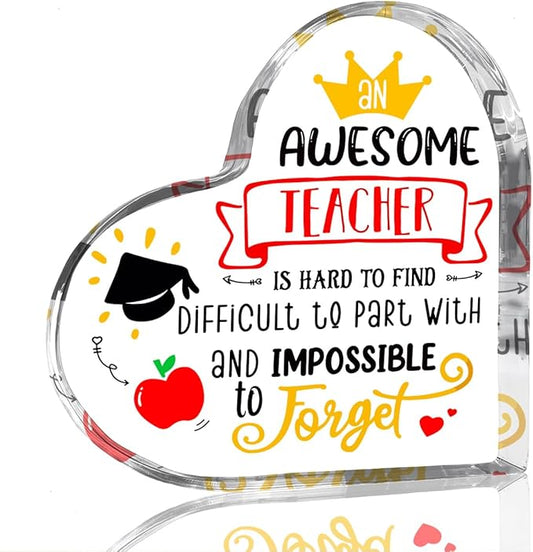 Acrylic heart teacher keepsake with graduation cap and 'Awesome Teacher' quote.