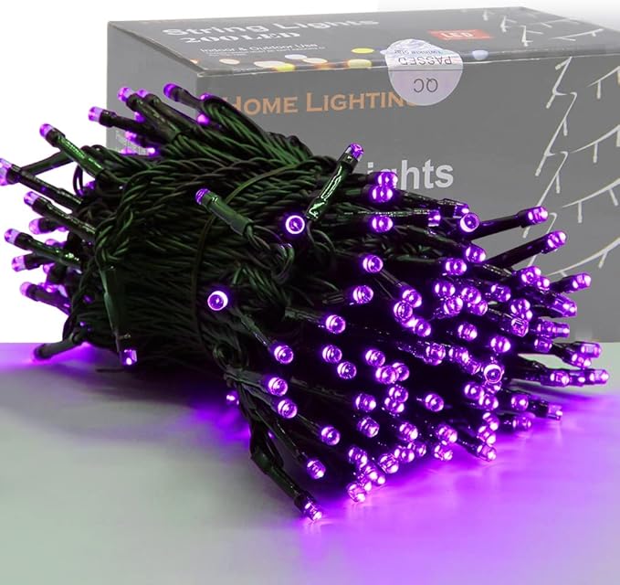 Purple LED mini string lights on green wire, starry bulb cluster close-up