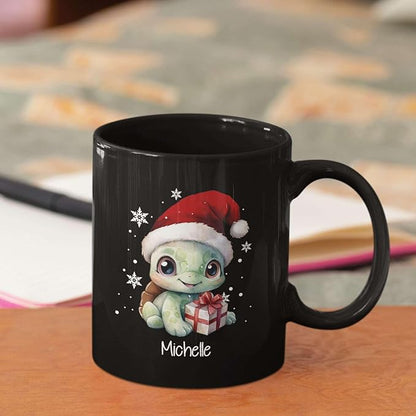 Black ceramic mug with turtle in Santa hat holding gift, name Michelle, angled view