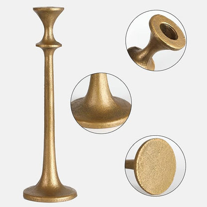Brass iron taper candle holder with flared top and round base, close-up.