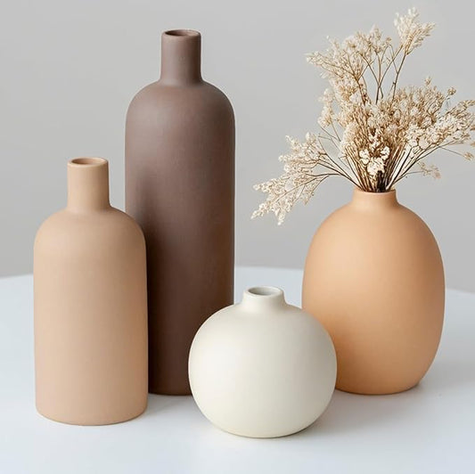 Set of 4 matte ceramic vases in neutral coffee, terracotta, and peach tones