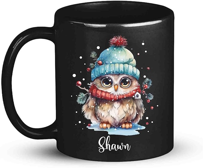 Black ceramic coffee mug with winter owl design and 'Shawn' name on front