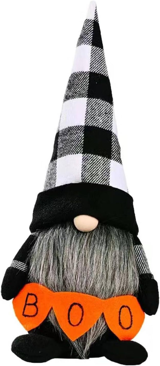 Black-and-white witch gnome plush with gray beard, orange "BOO" band, small black shoes