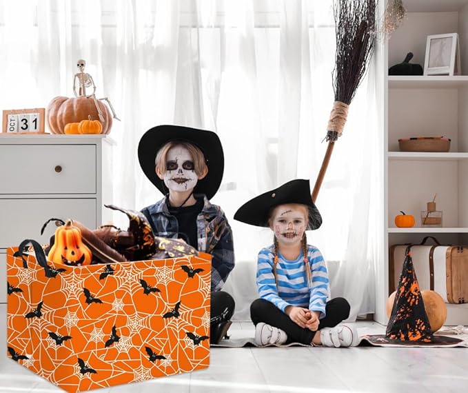 Orange rectangular Halloween storage basket with black bat and spiderweb pattern, open top