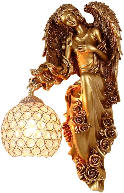 Gold angel wall sconce with ornate roses and clear crystal globe shade