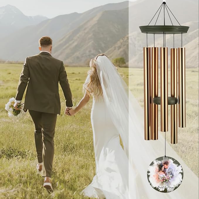 Outdoor wind chime with gold-tone tubes and round couple-photo anniversary ornaments