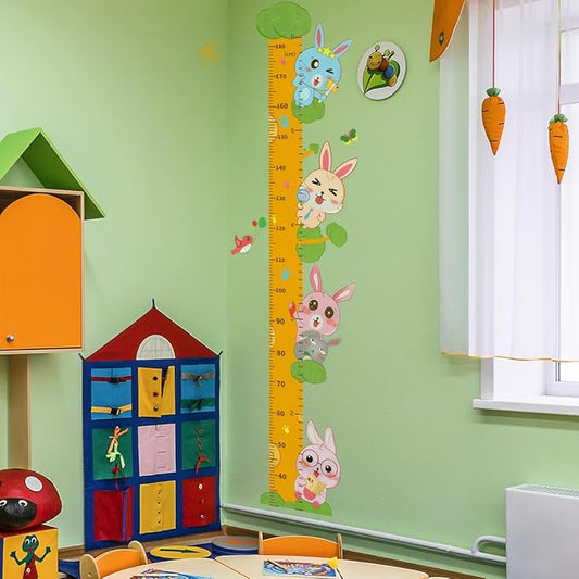 Rabbit growth chart wall decal with tall green numbered ruler and small critter icons
