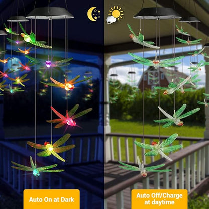 Solar dragonfly wind chimes with multicolor LED glow hanging from a lantern top