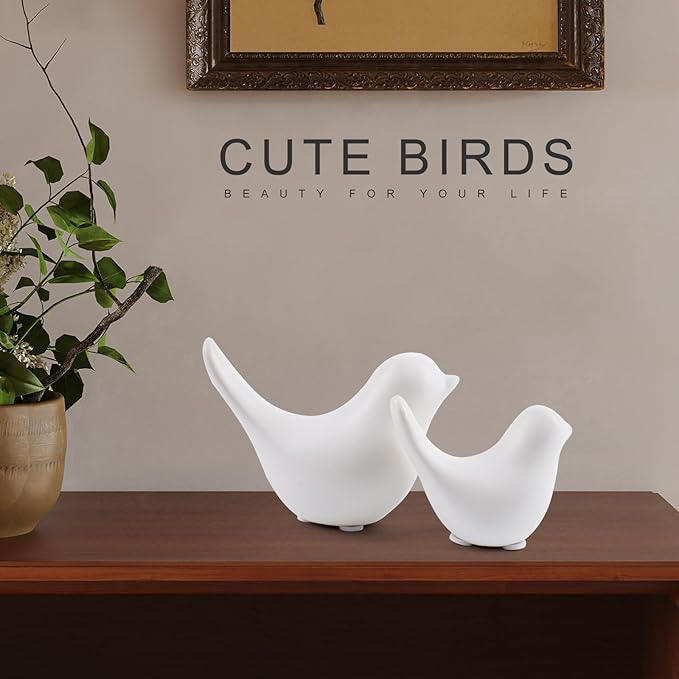 Ceramic white bird figurine set of 2 on wooden shelf, paired perched shapes