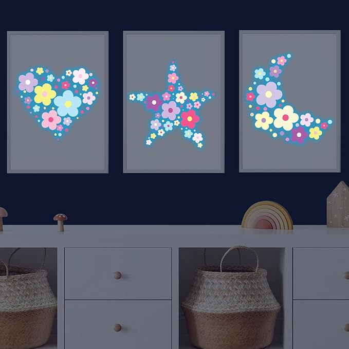 Glow-in-the-dark flower wall decals shown on three framed-style panels with multicolor blossoms