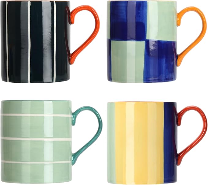 Set of four hand-painted ceramic mugs with striped and checkered colorful glazes, orange handles