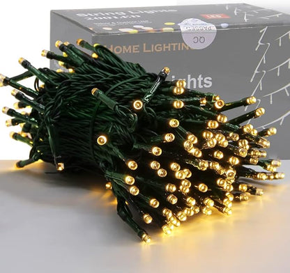 Warm white mini LED fairy string lights with green wire, bundled with round bulbs