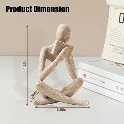 Beige resin reading thinker bookend statue, seated reading pose with measured proportions