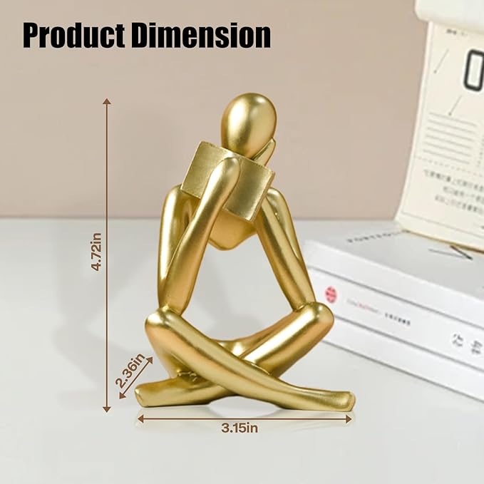Gold reading thinker bookend statue, seated with bent arms and extended legs.