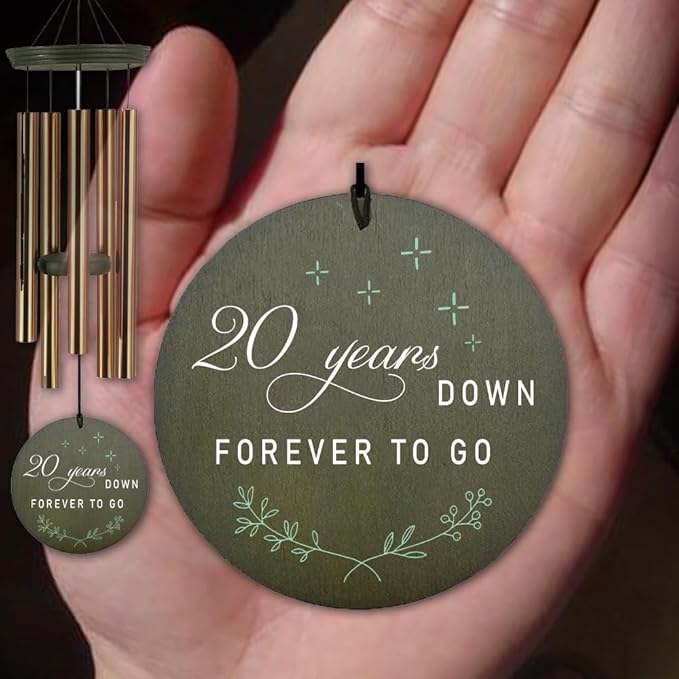 Dark green round wind chime keepsake disc reading 20 years down