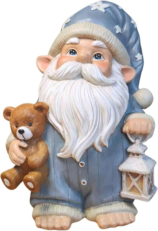 Whimsical blue resin garden gnome statue holding teddy bear and lantern