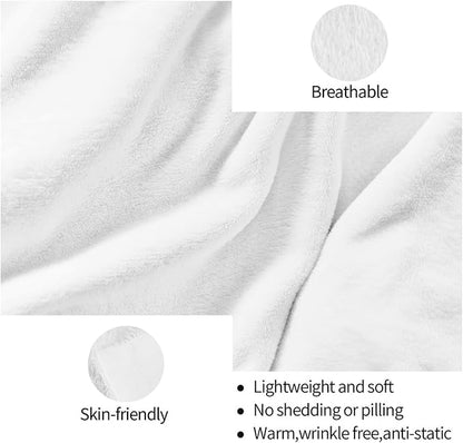 White fleece throw blanket fabric closeup with soft, breathable texture
