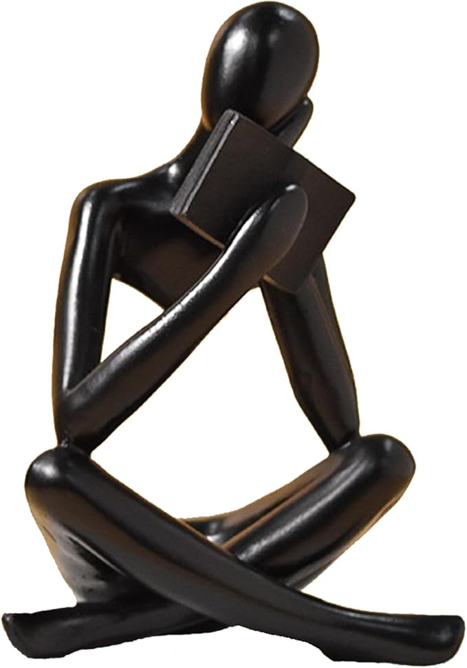 Black abstract resin thinker figurine, seated reading pose