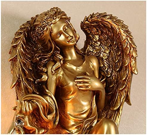 Gold angel wall lamp ornament with detailed wings and cherub face