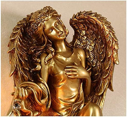 Gold angel wall lamp ornament with detailed wings and cherub face