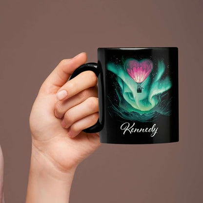 Black coffee mug with green aurora hot air balloon heart design and name Kennedy