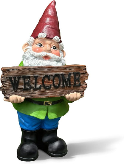 Garden gnome figurine holding “WELCOME” sign, tall red cap, white beard, green top, blue pants.