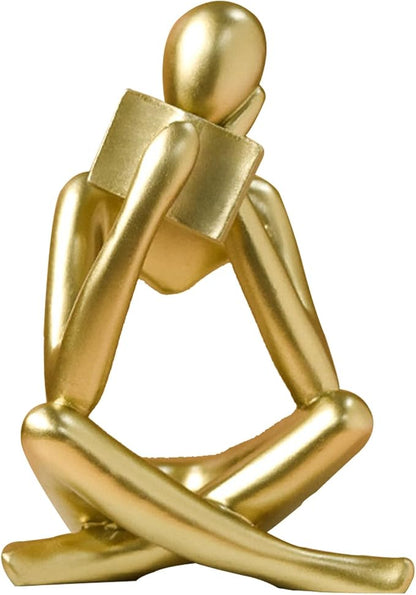 Gold resin reading figurine statue, seated cross-legged with rounded head