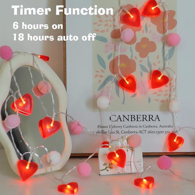 Valentine string lights with red heart LEDs and pink pom poms, timer feature