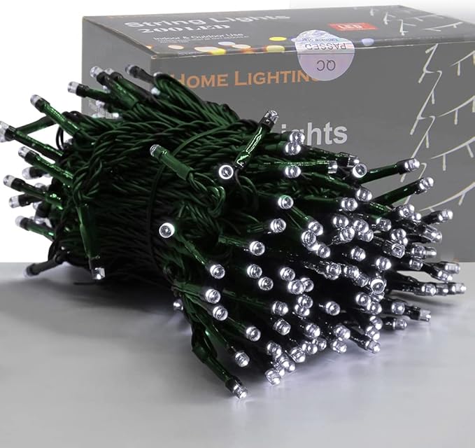 Green-wire mini LED Christmas string lights with round bulbs, close-up view.
