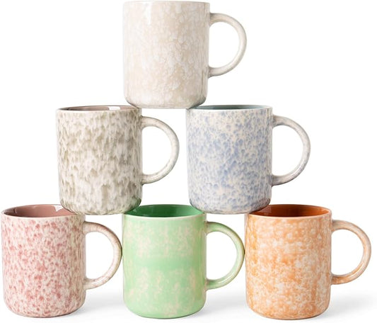 Set of 6 speckled ceramic coffee mugs in pastel colors with curved handles