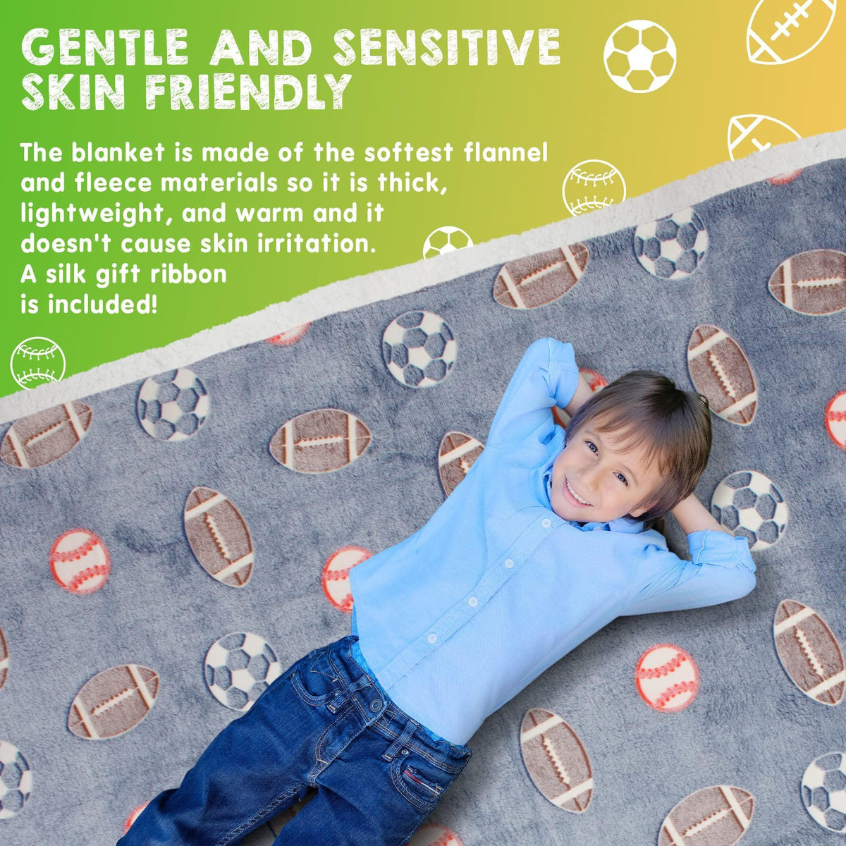Gray sports blanket with football and soccer ball prints, baby lying under it