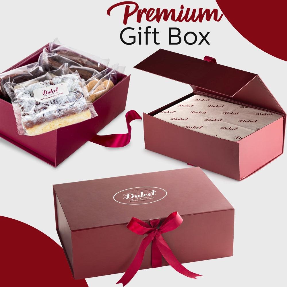 Premium gift box set with red bow ribbon and wrapped cookies inside
