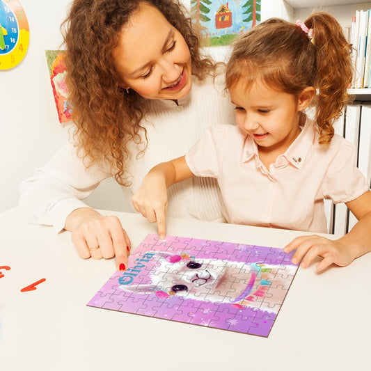 Children assembling a purple wooden puzzle with colorful llama design