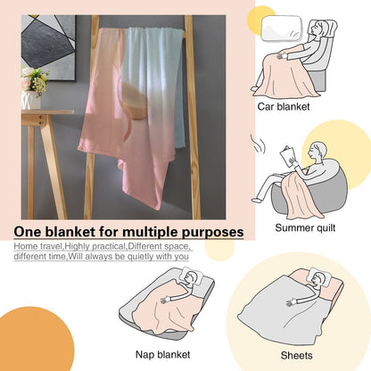 Pink and light-blue character blanket shown folded, featuring bear graphic and “Gabriella”