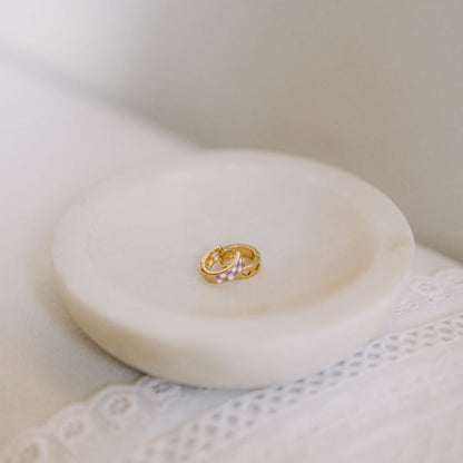 Pair of gold-filled huggie hoops with pastel checkered inlays