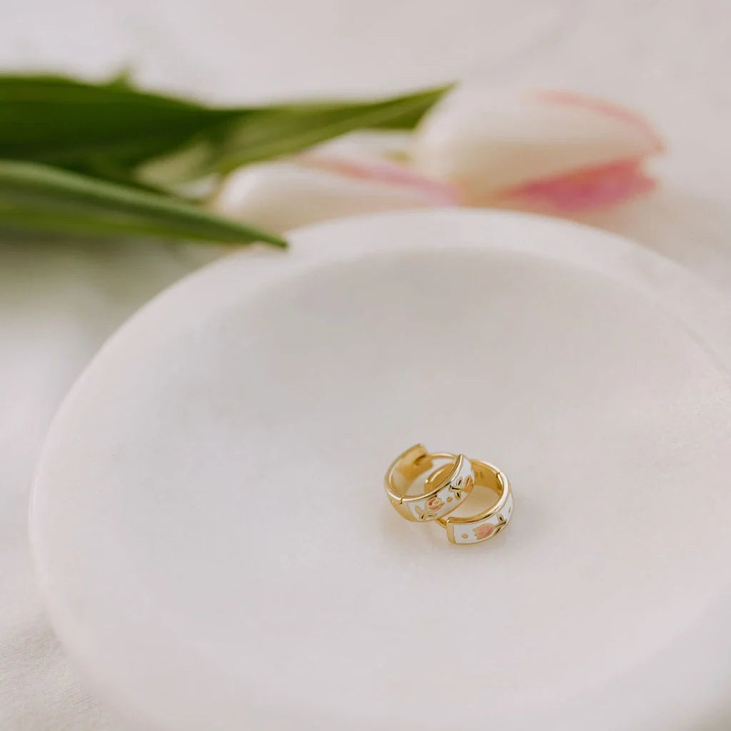 Pair of gold enamel huggie hoops with floral tea cup motifs