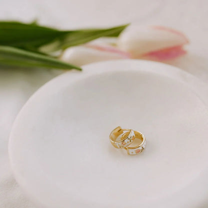 Pair of gold enamel huggie hoops with floral tea cup motifs