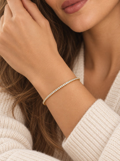 Gold-filled thin pavé cuff bracelet on wrist