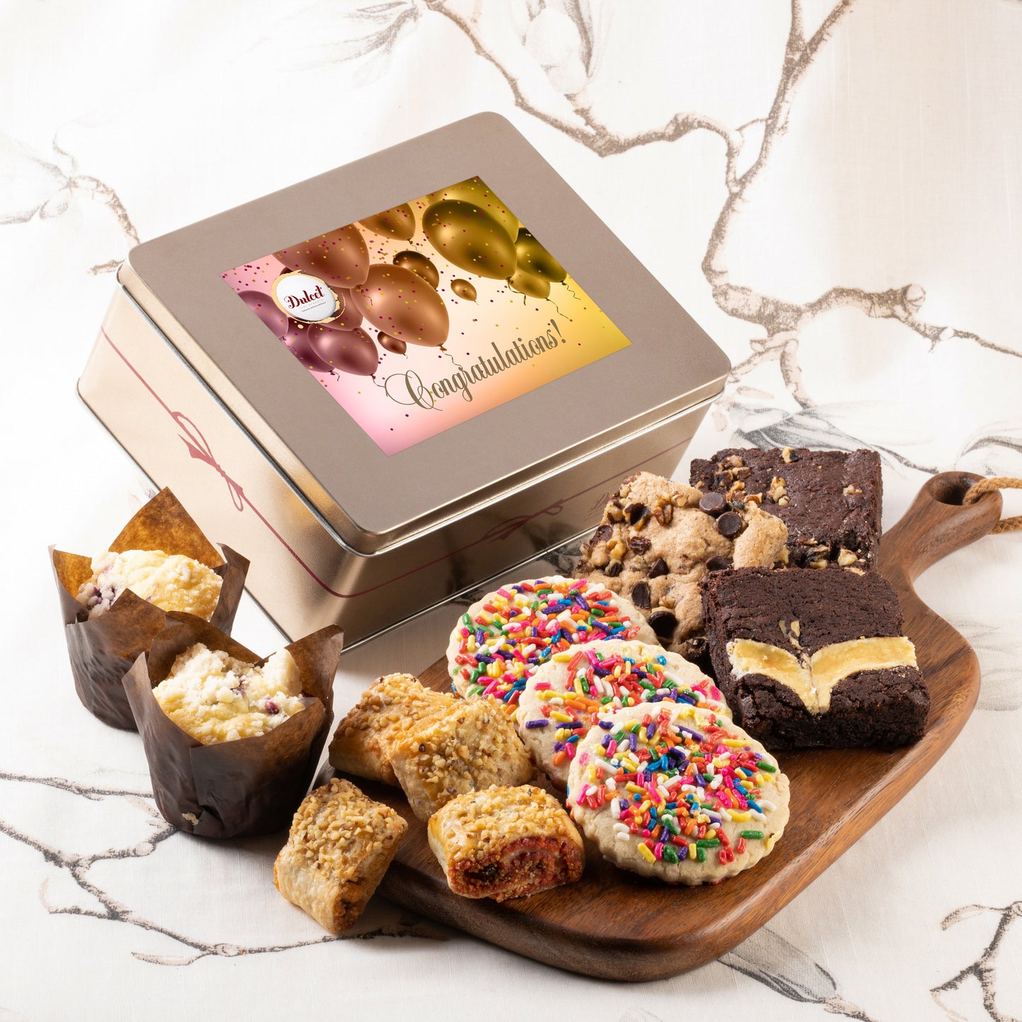 Cookie and brownie gift tin with “Congratulations” label