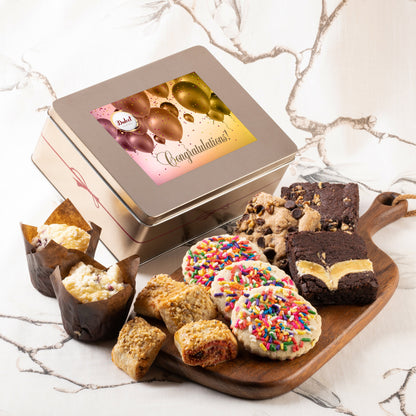 Cookie and brownie gift tin with “Congratulations” label