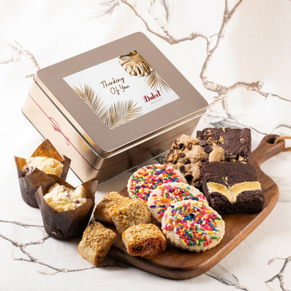 Cookie and brownie gift tin with “Thinking of You” label