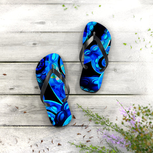 Octopus print flip-flops, blue tentacle pattern with black straps, pair angled