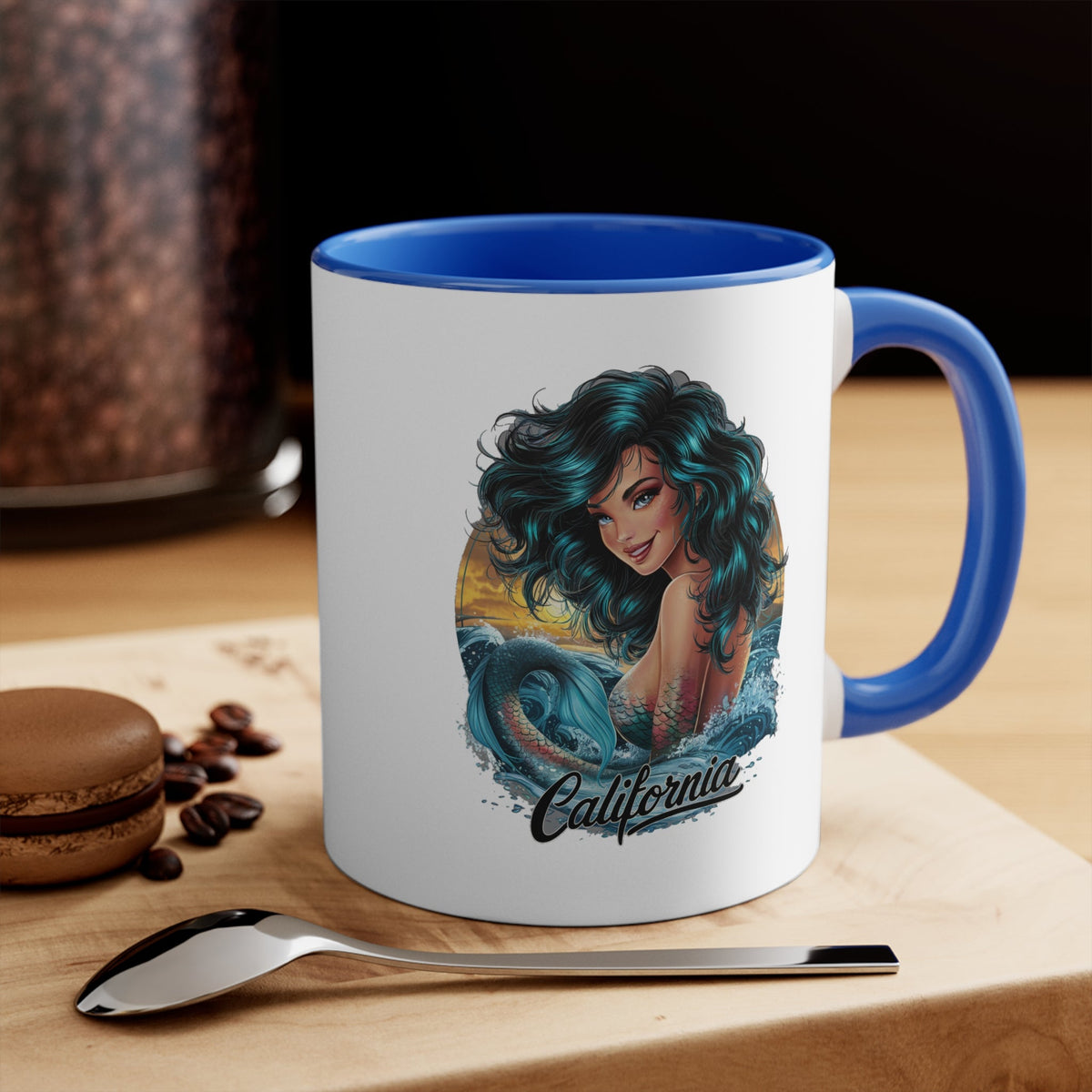 Blue-accent ceramic mug with mermaid graphic and California text on front