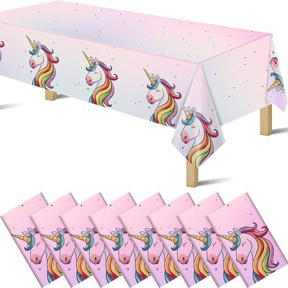 Unicorn pink plastic tablecloth with rainbow unicorn heads and star confetti, disposable