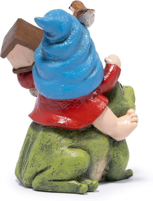 Garden gnome figurine side view with blue hood, red scarf, white beard, and frog companion.