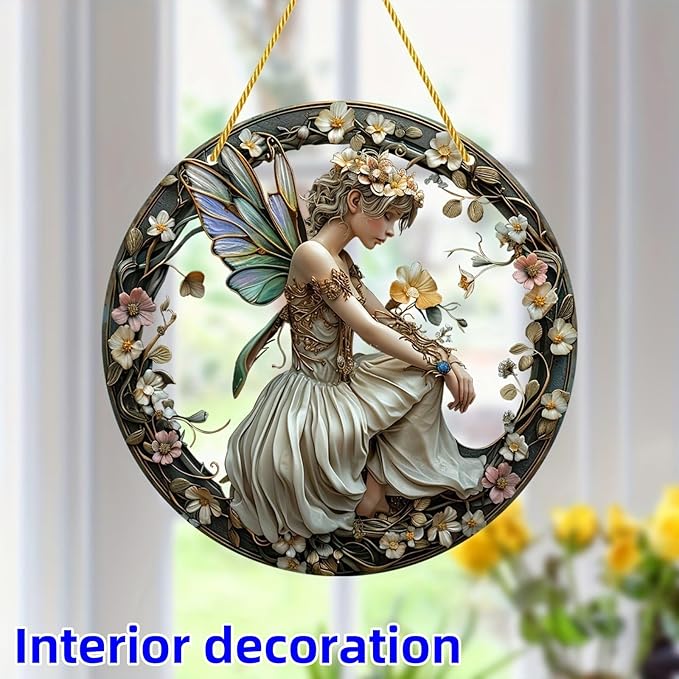 Round fairy ornament with iridescent wings and floral border, shown as interior decor
