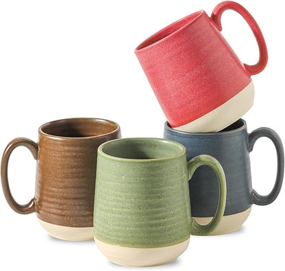Set of four ceramic coffee mugs in red, brown, green, and blue with handles.